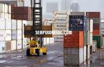 ID 1859 PORT OF AUCKLAND, NZ - A mast-lift truck working among container stacks, Axis Fergusson Container Terminal.